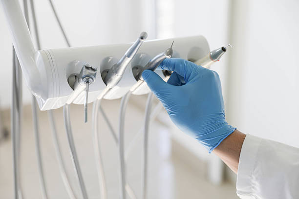 Professional Emergency Dentist technician working in DeKalb, IL